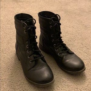 Black combat boots.